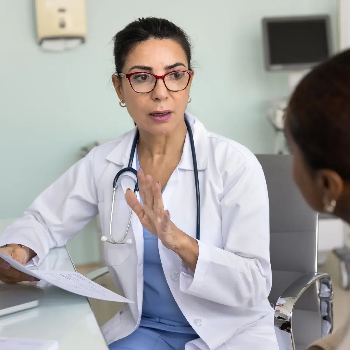 A Georgia Nephrology physician in conversation with a patient